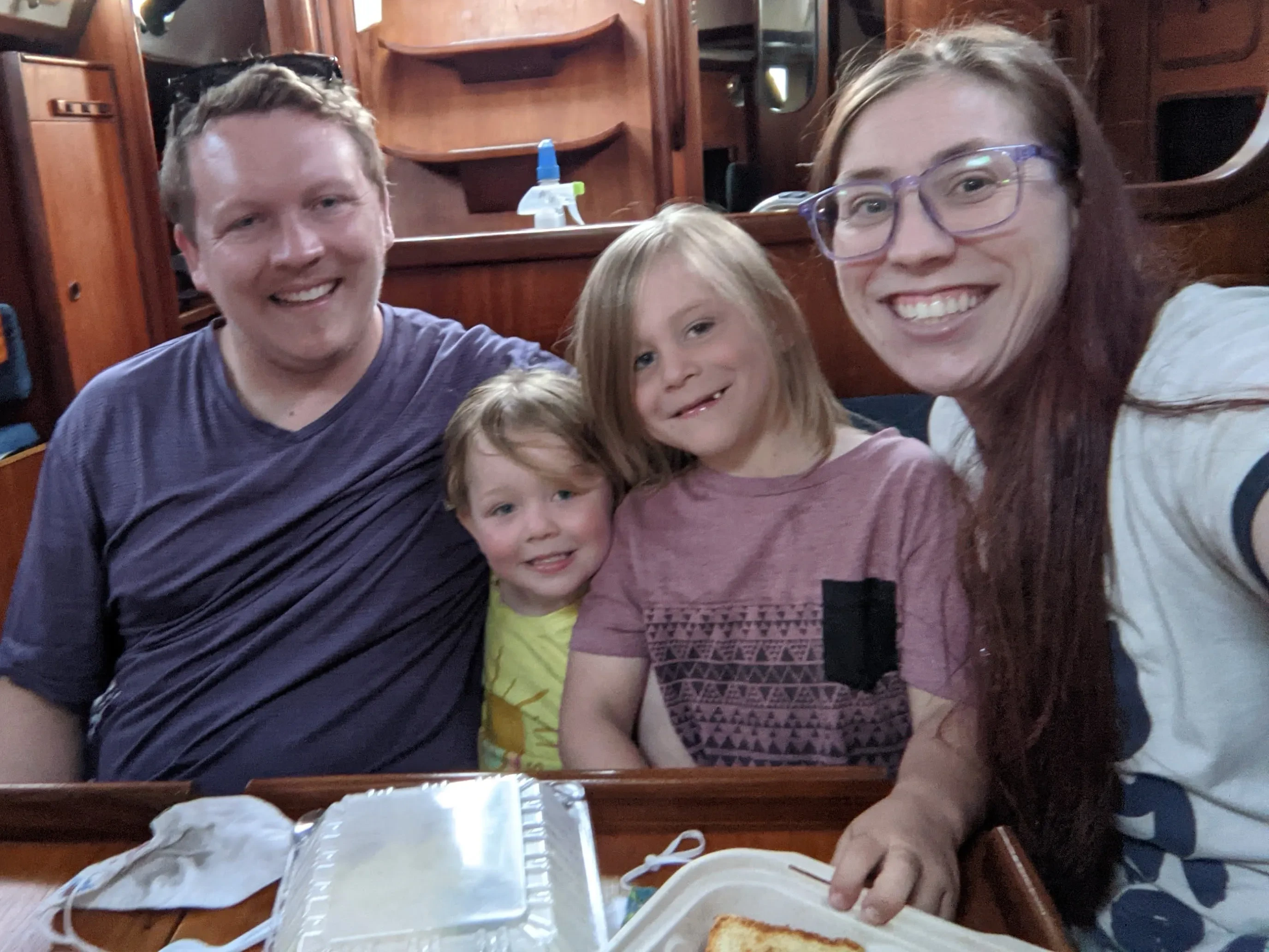 Bryan, Eloise, Henley, and Alicia enjoying their first meal aboard Jedi.